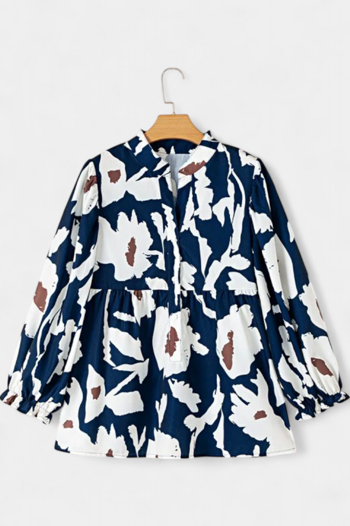 Filomena | Blusa con Media Botonadura y Manga Abullonada en Estampado Floral Abstracto